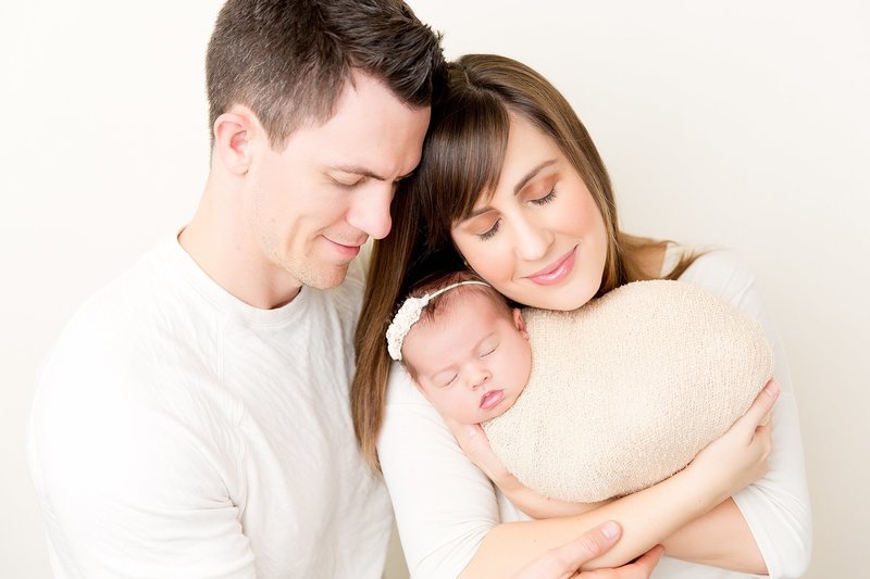 mom and dad with newborn