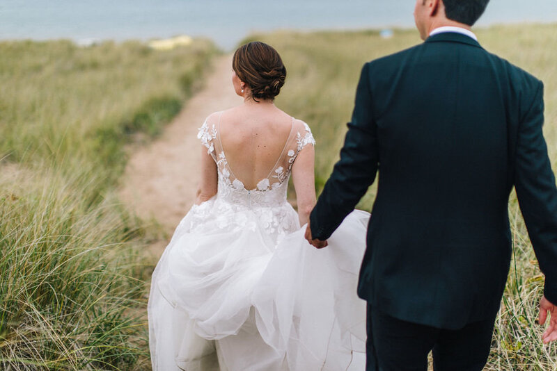 bride and groom on Lake Michigan beach