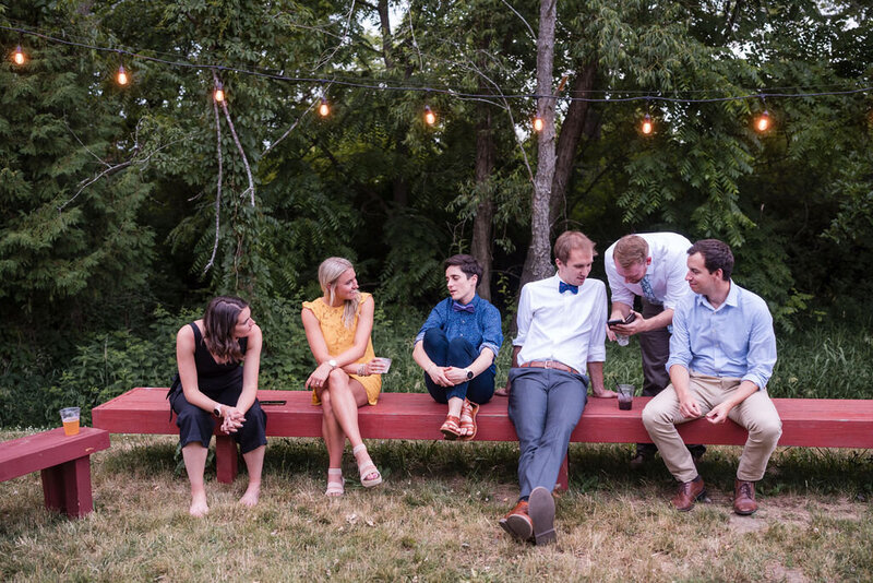 wedding guests chitchatting at barnwood events in madison, winconsin.