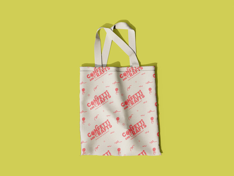 A mockup of a bag branded with the Confetti and Crafts logo