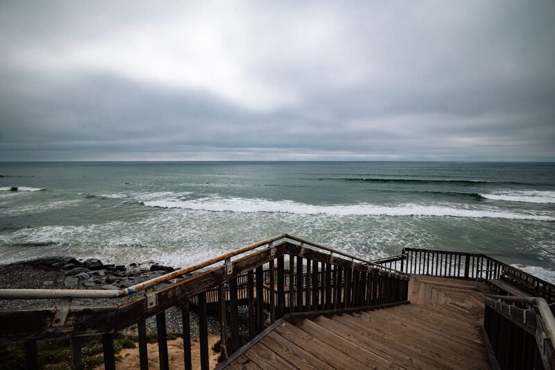 Winding staircase down to the beach at Cape Rey Carlsbad Beach wedding venue.