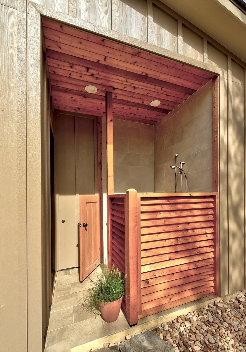 Outdoor shower with wooden panels