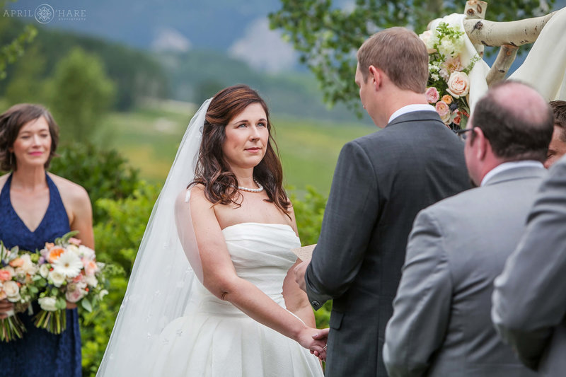Sweet moment at outdoor wedding at Mountain wedding garden Crested Butte