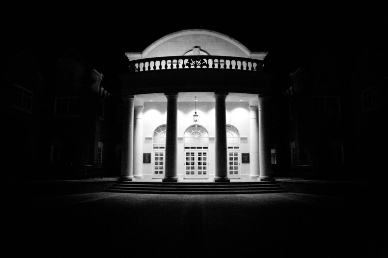 Night time view of the entrance to Wesley Hall at The Wesleyan School