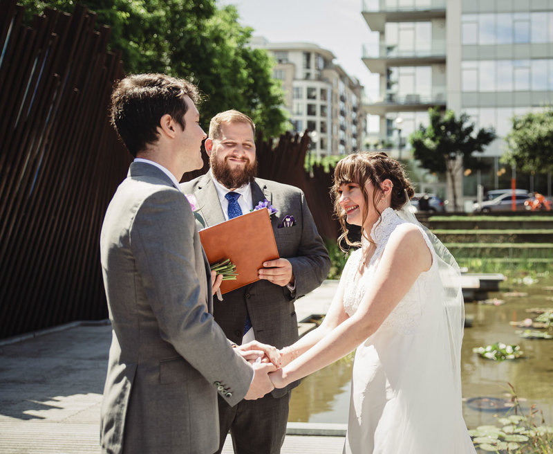 intimate wedding ceremony at Tanner Springs Park in Portland, Oregon