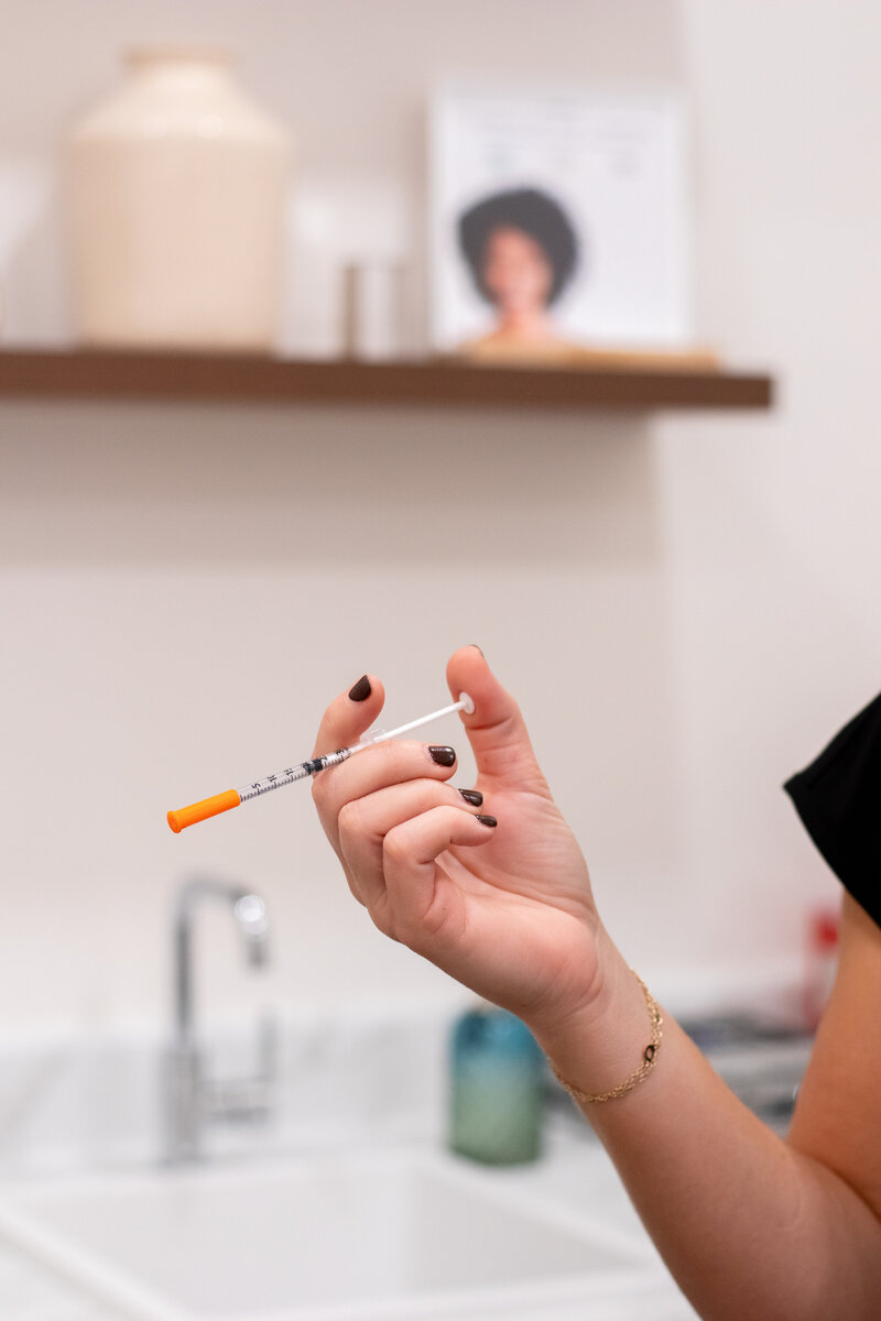 two men holding hands smiling