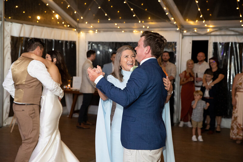 Groom and mom dance at wedding reception