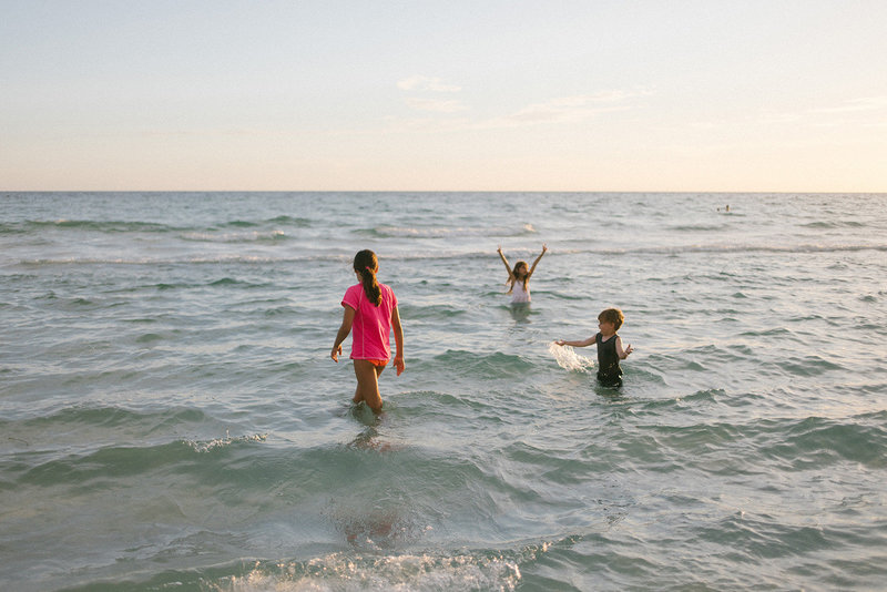 Laurie Baker captures her children playing in the water during vacation