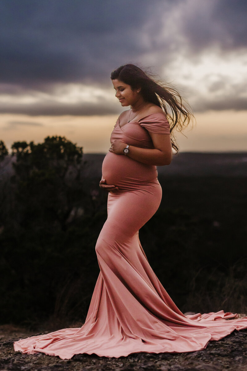 woman posed for maternity photo session