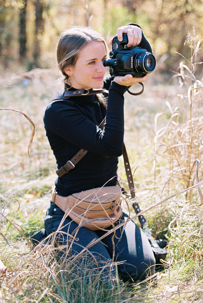 Kentucky film photographer Tricia Taylor holding medium format pentax camera