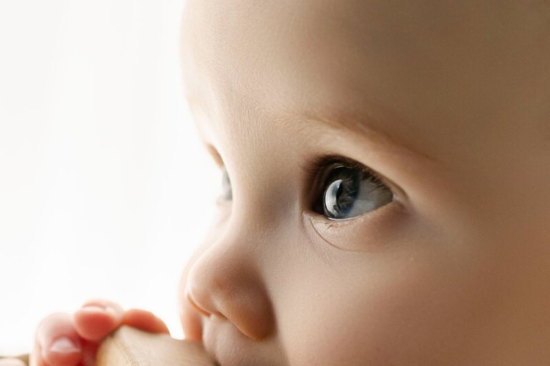Close up of baby side profile taken by cake smash photographer nj
