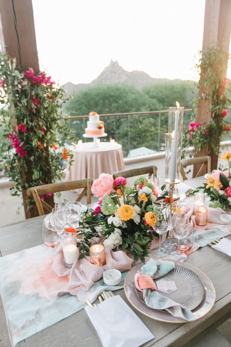 Arizona wedding reception with florals and wedding cake