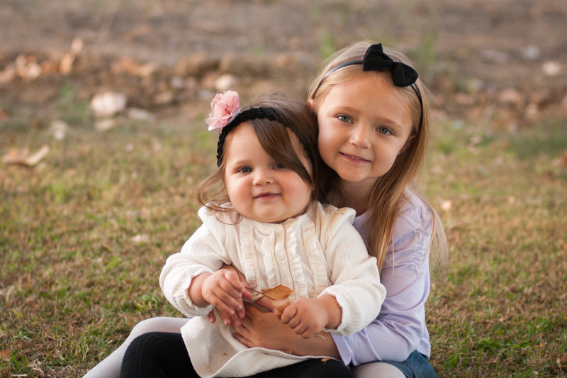 Sister siblings in family photoshoot by One Shot Beyond Photography