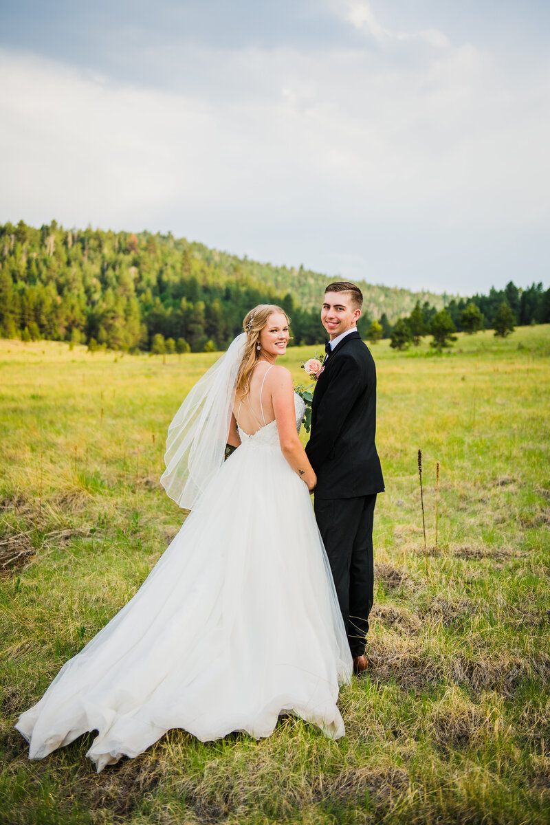 Julia Romano Photography Flagstaff wedding elopement bride groom field grass