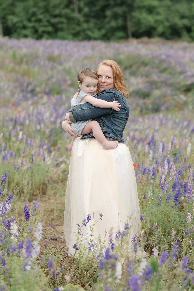 Winston-Salem photographer Emily Richardson holding her child