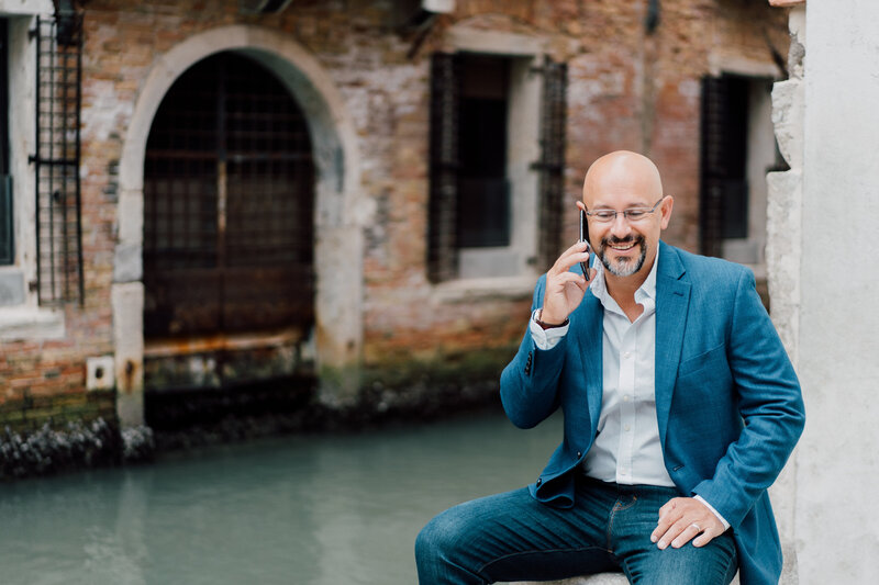 Sam Jacobson, sales and pricing expert for wedding professionals, on a call in Venice.