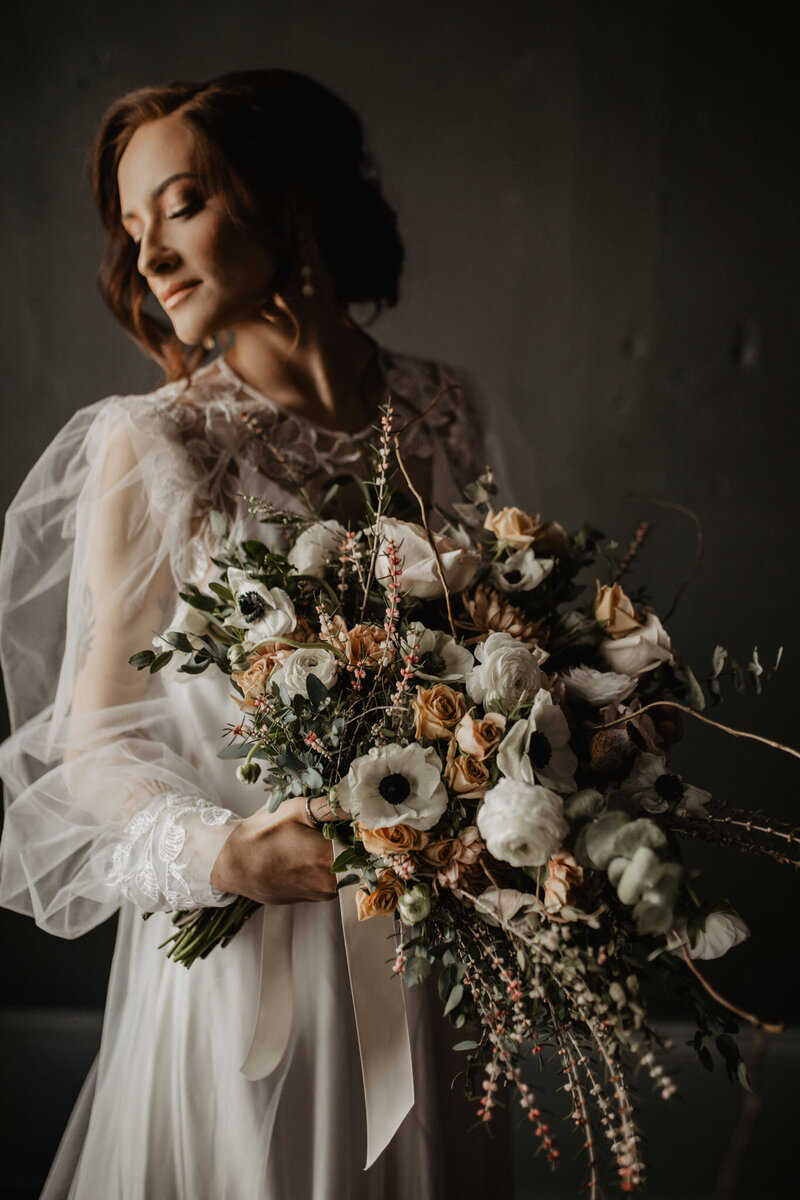 luxury wedding bride holding bouquet