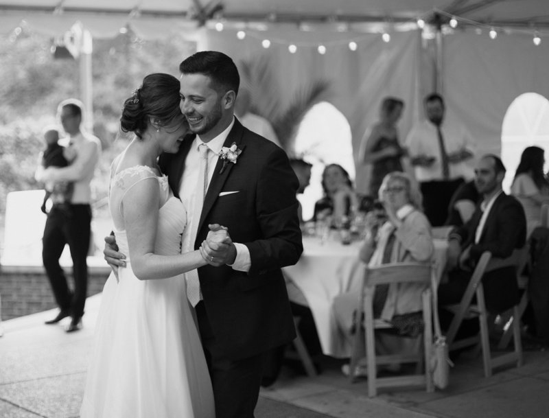 Bride and groom share first dance at their National Aviary  wedding reception in Pittsburgh, PA