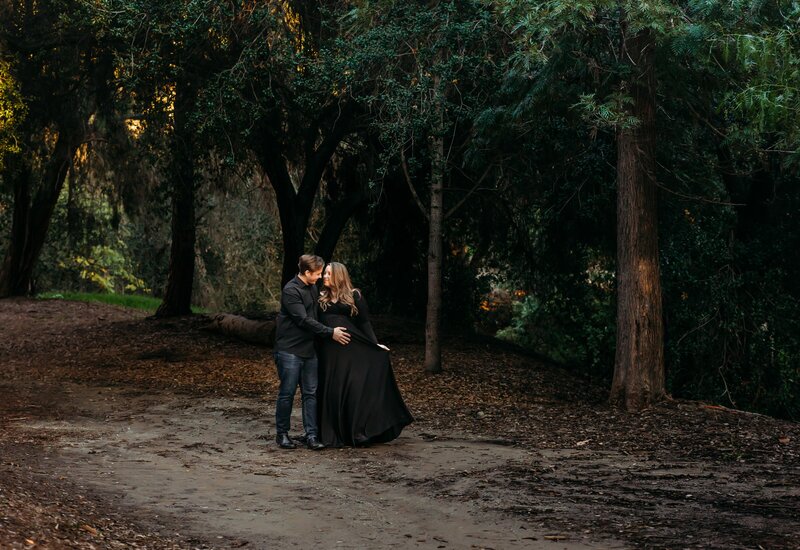 Moody maternity session in the woods