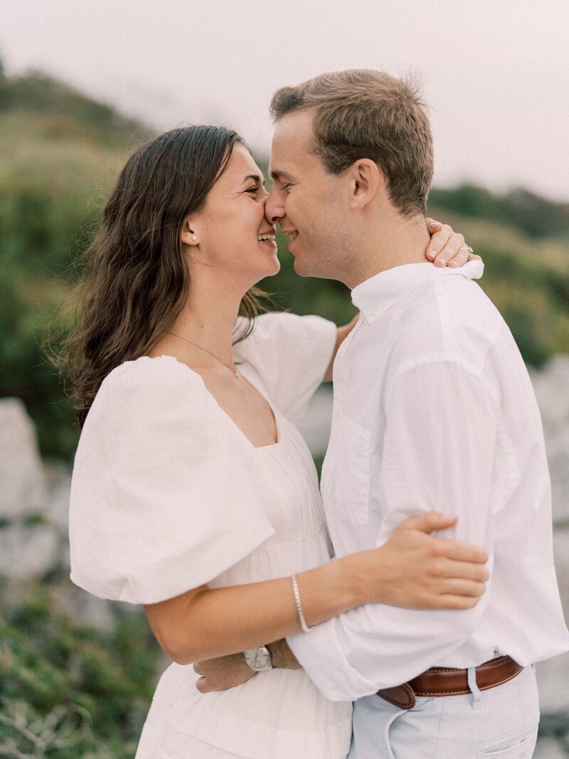 Engagement session couple embracing