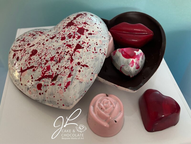hand-painted chocolate heart box with bonbon lips, rose, and hearts