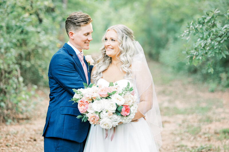 Chicago & Atlanta Wedding Photographer-2-5 Timeless bridal portrait of a bride holding her bouquet at Mystic Acres