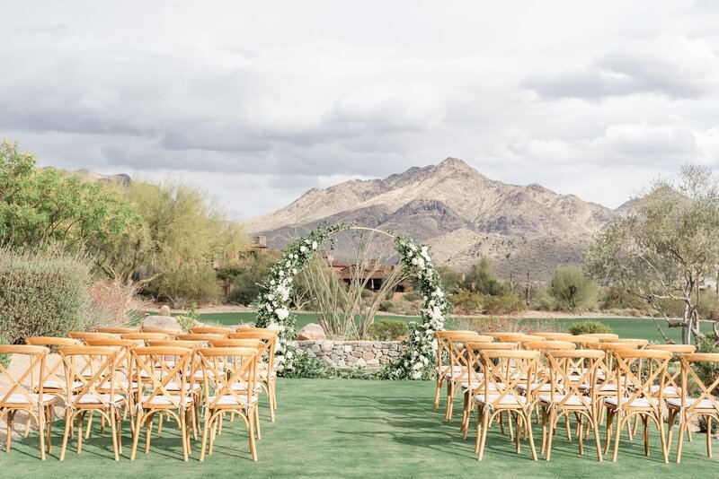 DC Ranch Weddings Ceremony lawn with circle arch and mountain views