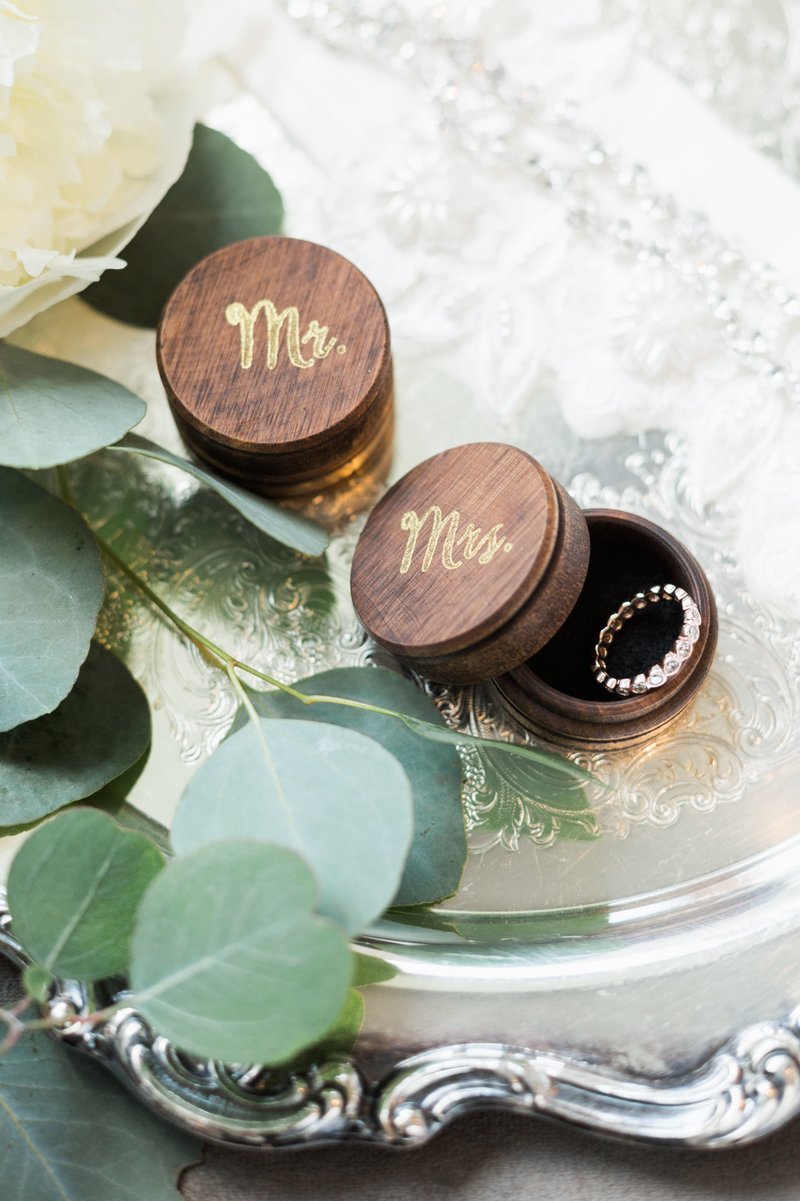 Wedding detail photography of wooden ring boxes