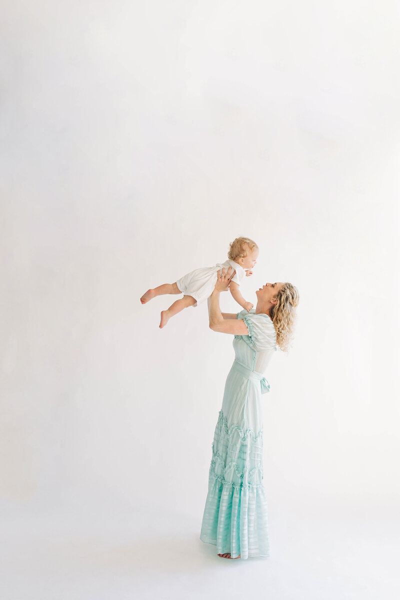 Studio portrait of a mother holding her toddler in Oxford, Mississippi