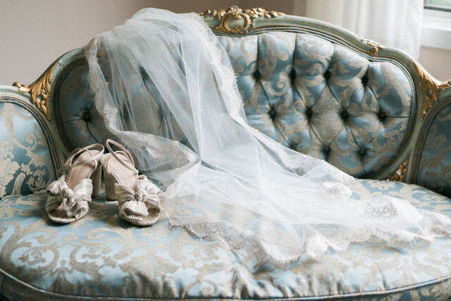loeffler randall bridal shoes on vintage sofa with veil