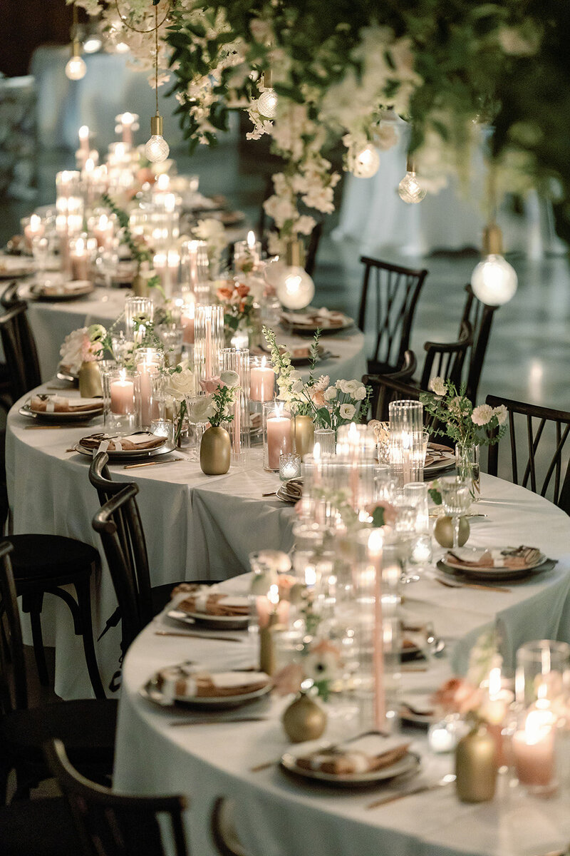 Close up of a candle lit wedding reception