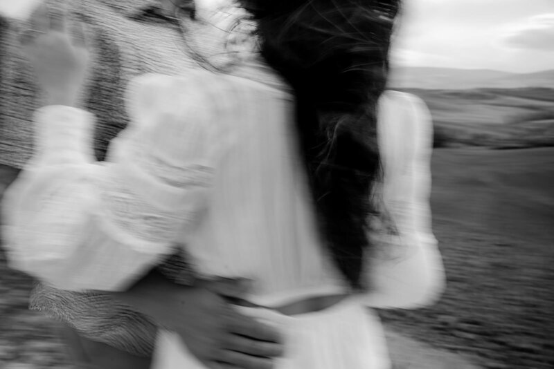 Blurred photo of a couple in Val D'Orcia Tuscany