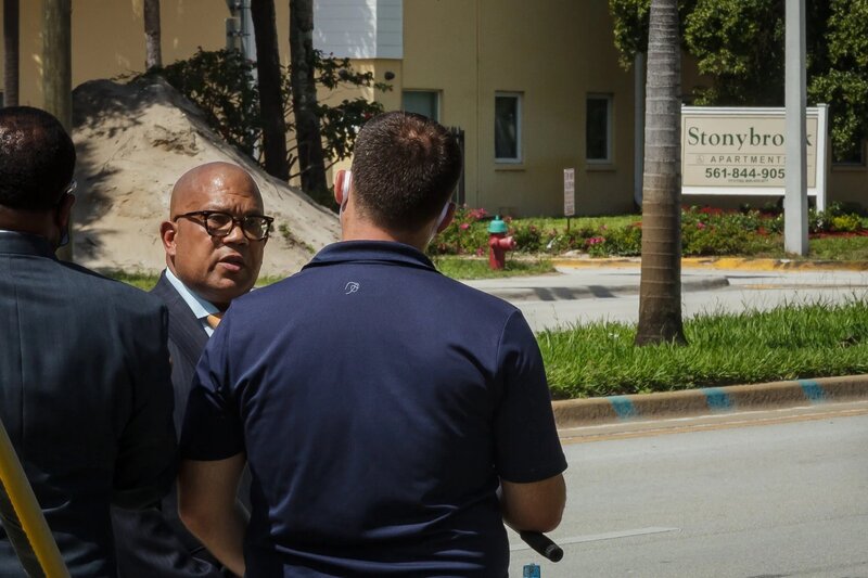 Attorney Richard Ryles in front of stony brooks apartments complex
