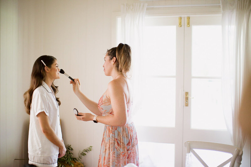 Bride getting her make up ready