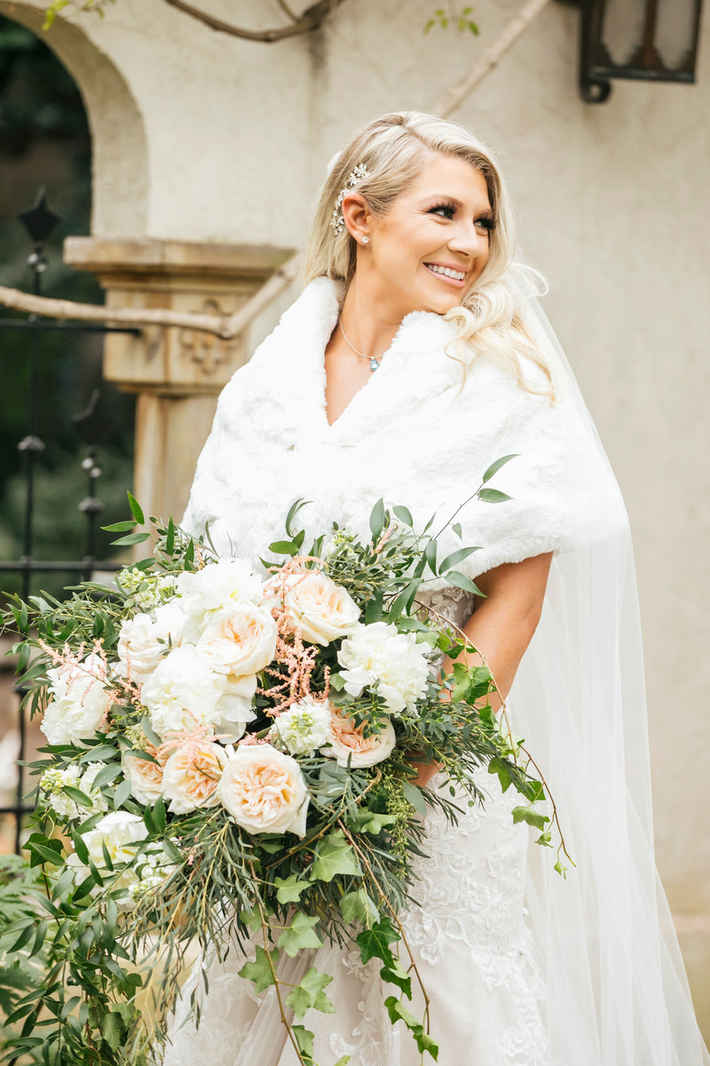 Bride with floral bouquet in St Louis