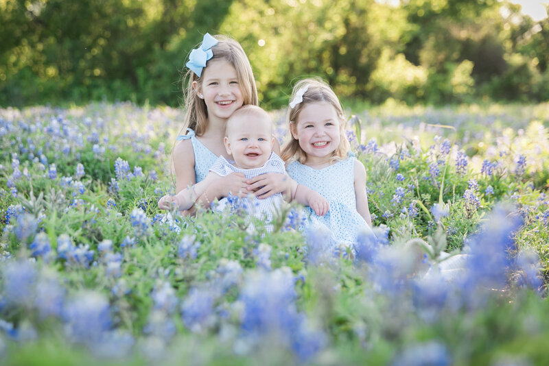 Three siblings in Bluebonnets, Austin Family Photographer