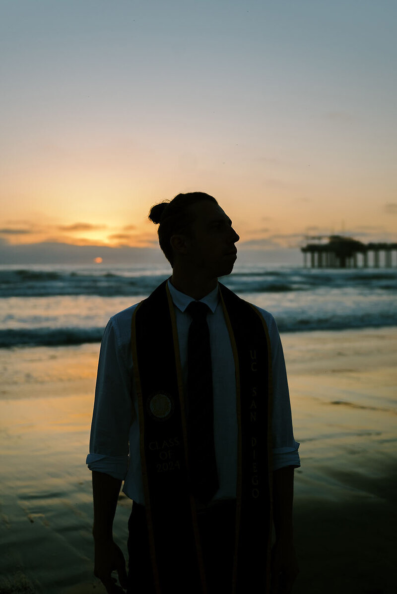UC San Diego senior guy graduation photos at Scripps Beach