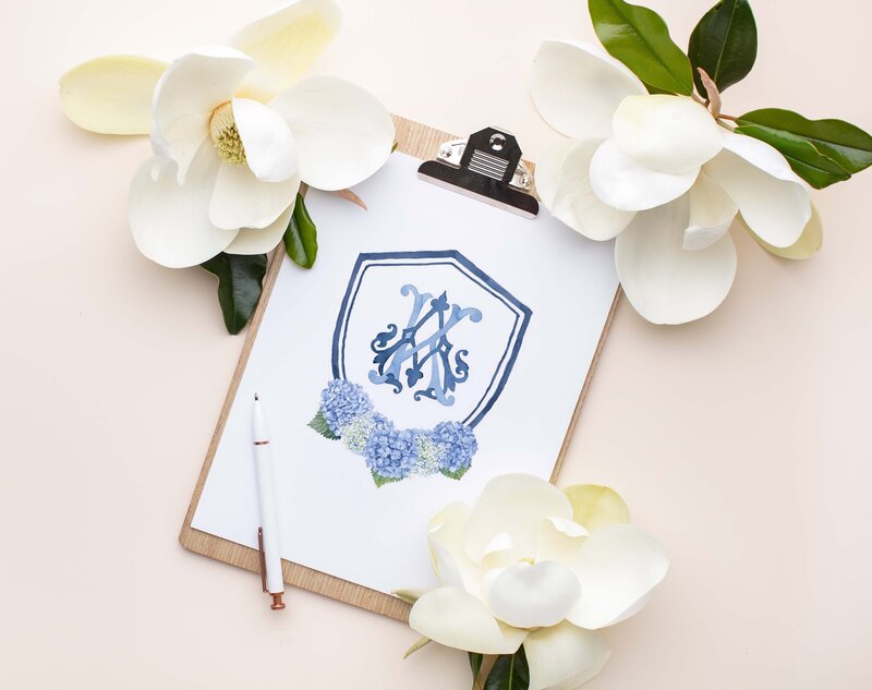 blue watercolor wedding crest with hydrangeas