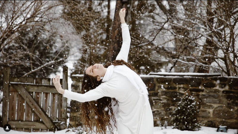 woman  dancing in snow