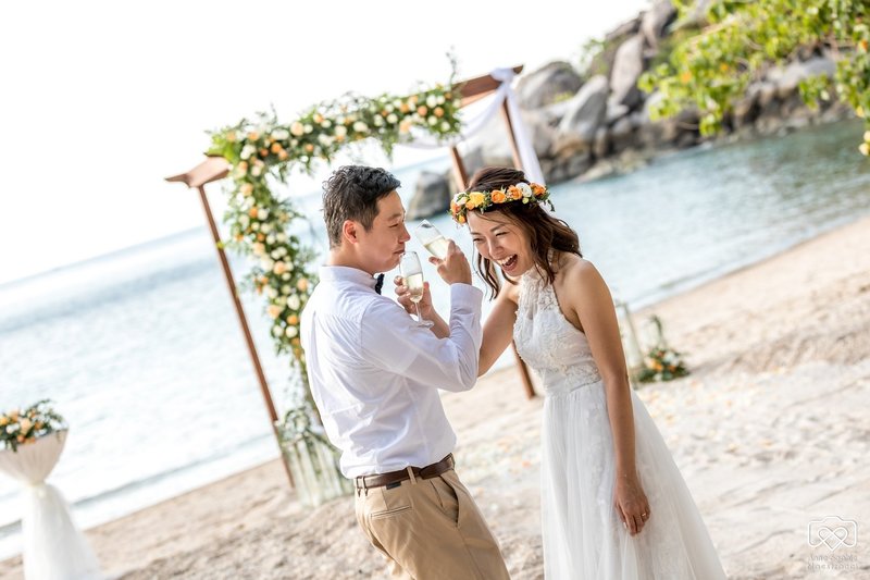 Couple with wedding arch on Koh Tao