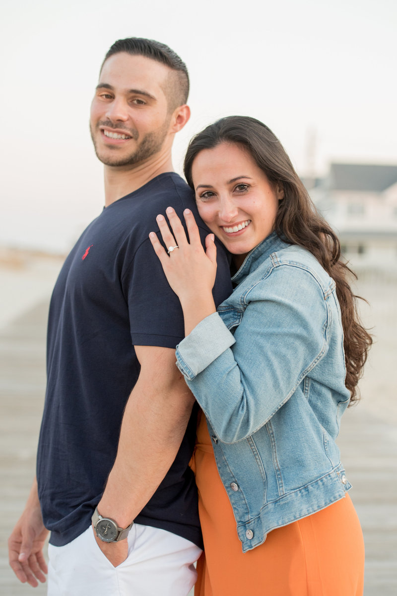 newly engaged portrait at lavallette boardwalk