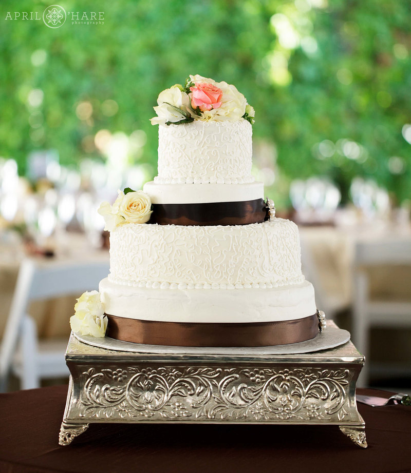 Pretty white wedding cake at Bella Vista Estate in Steamboat Springs Colorado