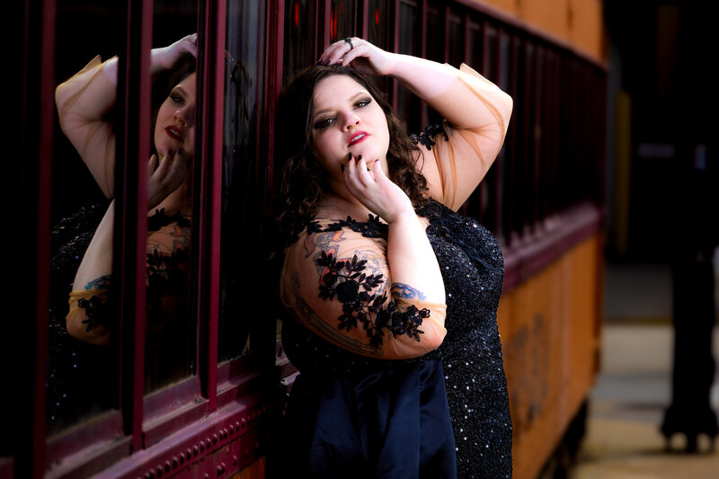 Lansing senior photographer Belinda Gaines capturing dramatic portraits with editorial-style lighting and posing.