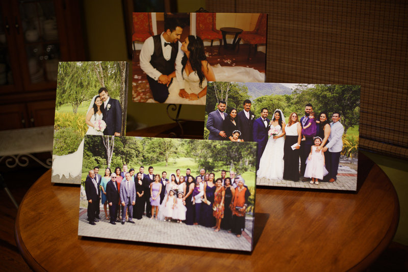 Art blocks and canvas prints in portrait and landscape orientation on tabletop. By Ross Photography, Trinidad, W.I..