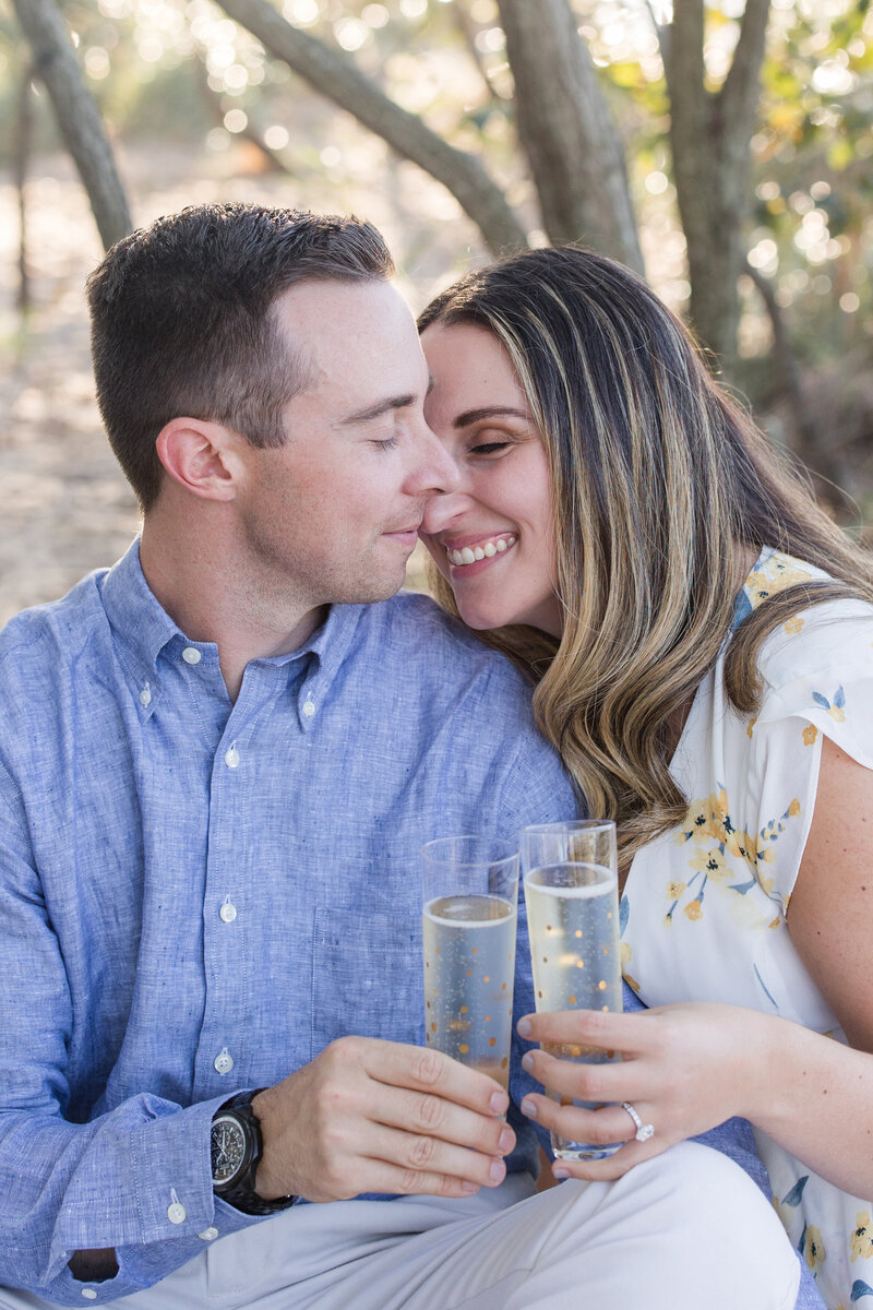 Terrapin Beach Park engagement photos with champagne by Annapolis, Maryland photographer, Christa Rae Photography