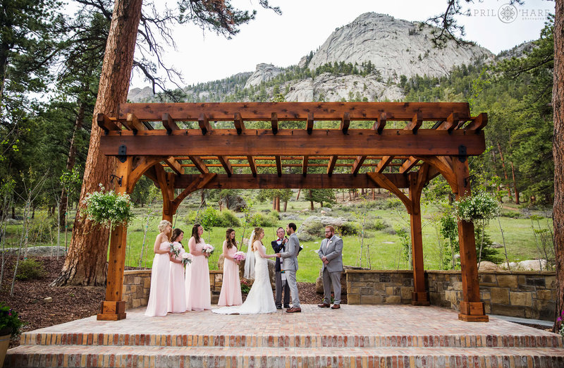 Wedding ceremony with mountain view from the outdoor terrace at Della Terra Mountain Chateau