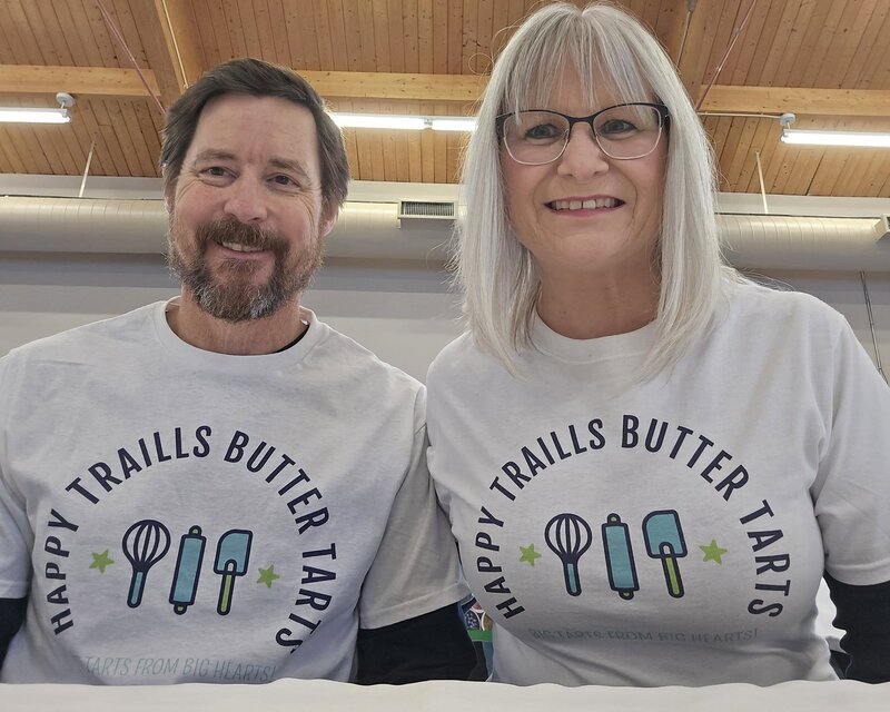 Happy Traills Butter Tarts owners Rich + Verena. Butter Tart Bakery in Northern Ontario. Larder Lake, Kirkland Lake, Rouyn-Noranda, Temsikaming Shores. Jumbo butter tarts.  Found locally at makrets