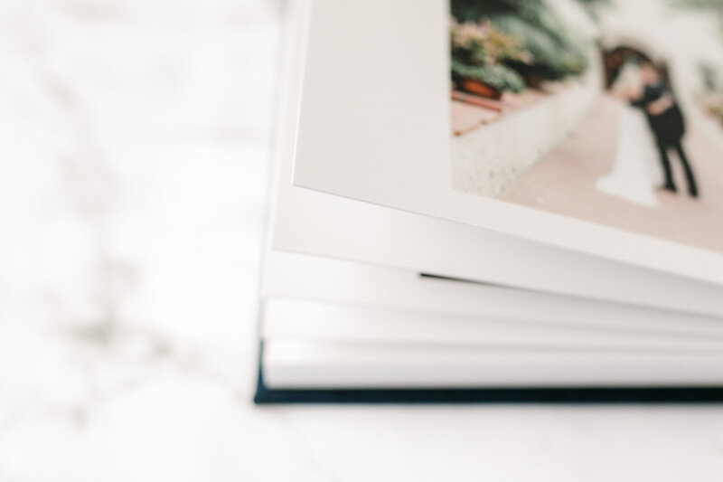 Open wedding photography album with pages turning