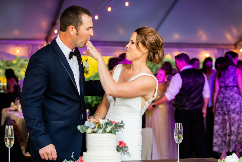 Groom licks icing off brides finger, Maryland Wedding Photography