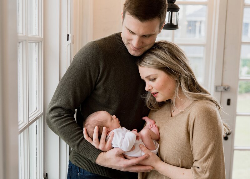 Milwaukee Couple Holding Newborn Baby
